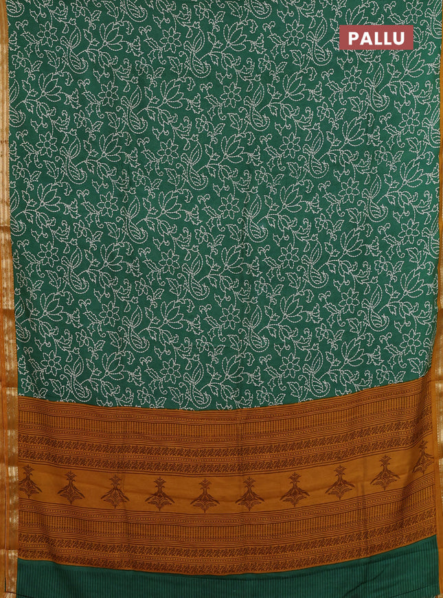 Muslin silk saree green and mustard yellow with allover prints and zari woven border
