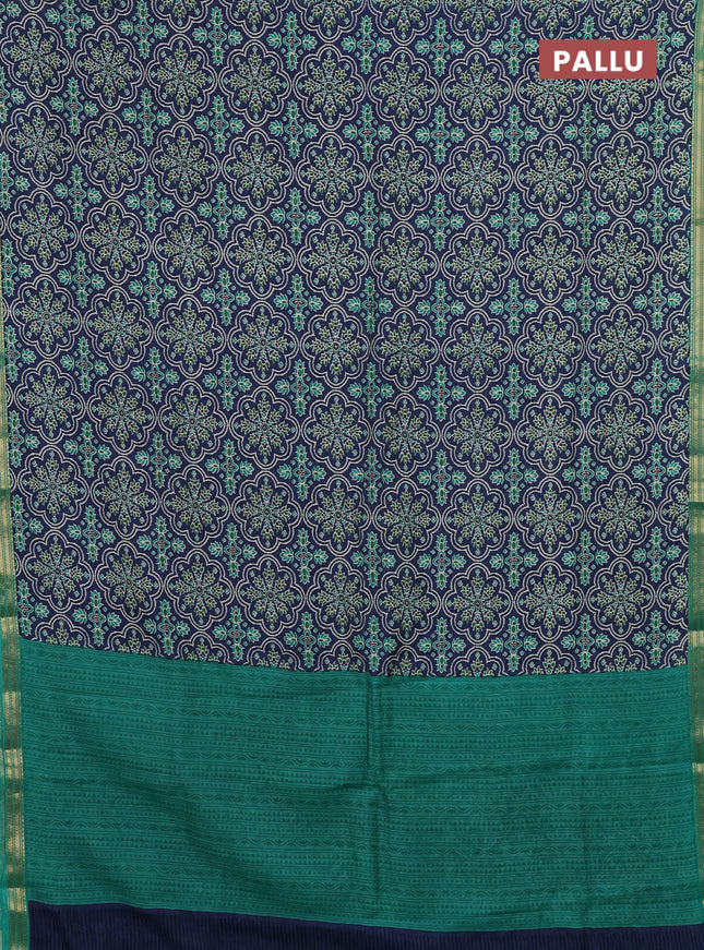 Muslin silk saree blue and teal green with allover prints and zari woven border