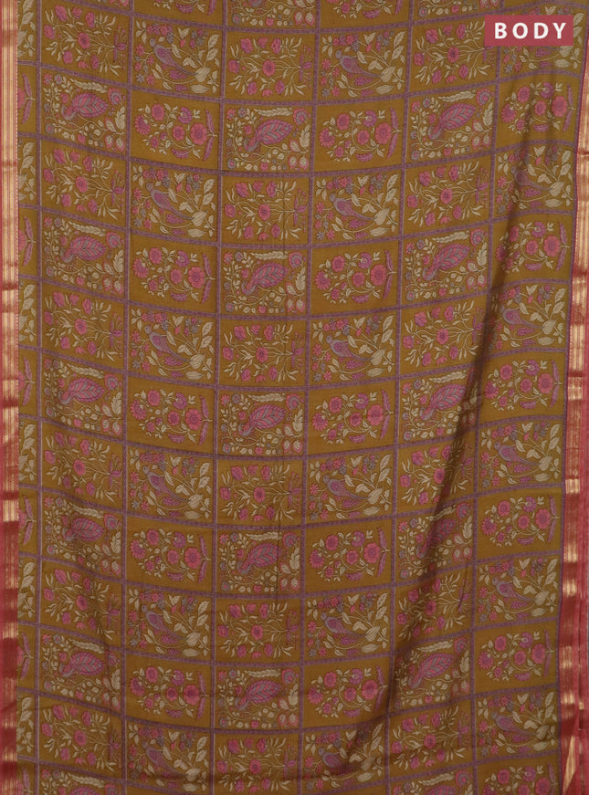 Muslin silk saree dark mustard and dark peach with allover prints and zari woven border