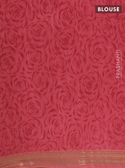 Muslin silk saree dark mustard and dark peach with allover prints and zari woven border