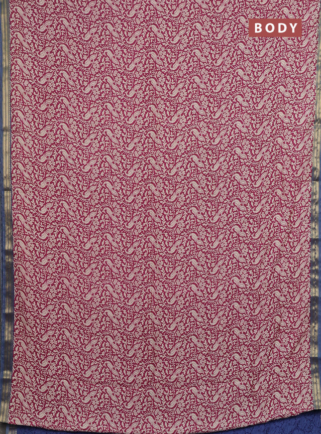 Muslin silk saree dark pink and blue shade with allover peacock prints and zari woven border