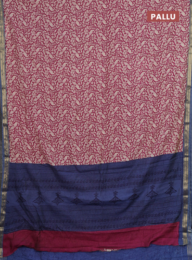 Muslin silk saree dark pink and blue shade with allover peacock prints and zari woven border