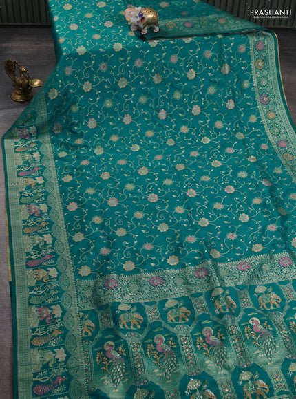 Banarasi semi raw silk saree teal blue with allover floarl zari weaves and thread & zari woven border
