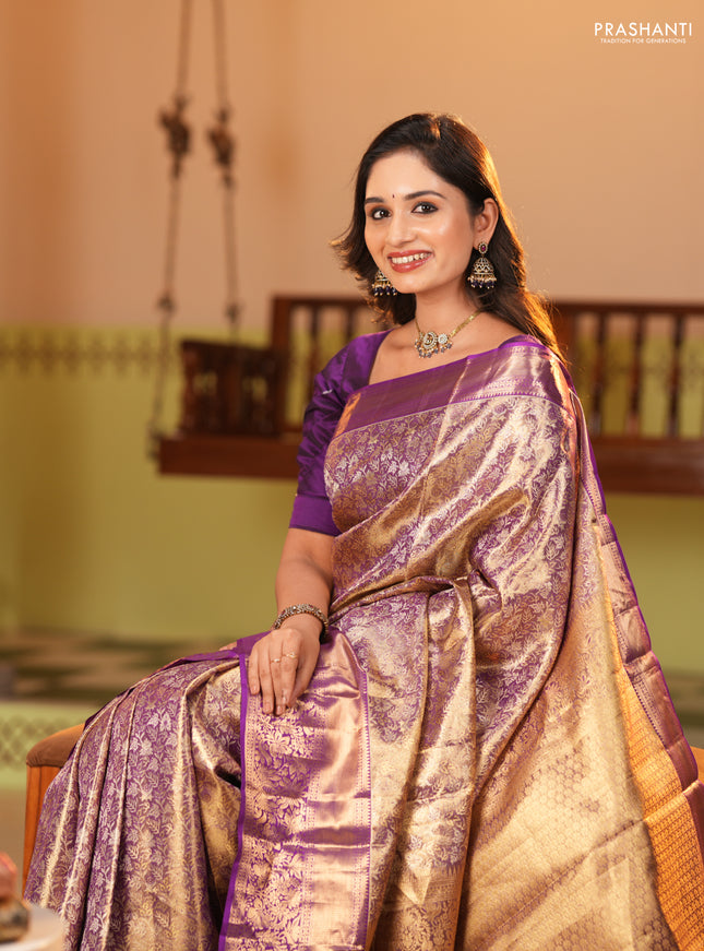 Pure kanchipuram tissue silk saree dual shade of purple and purple with allover zari woven brocade weaves and long zari woven border