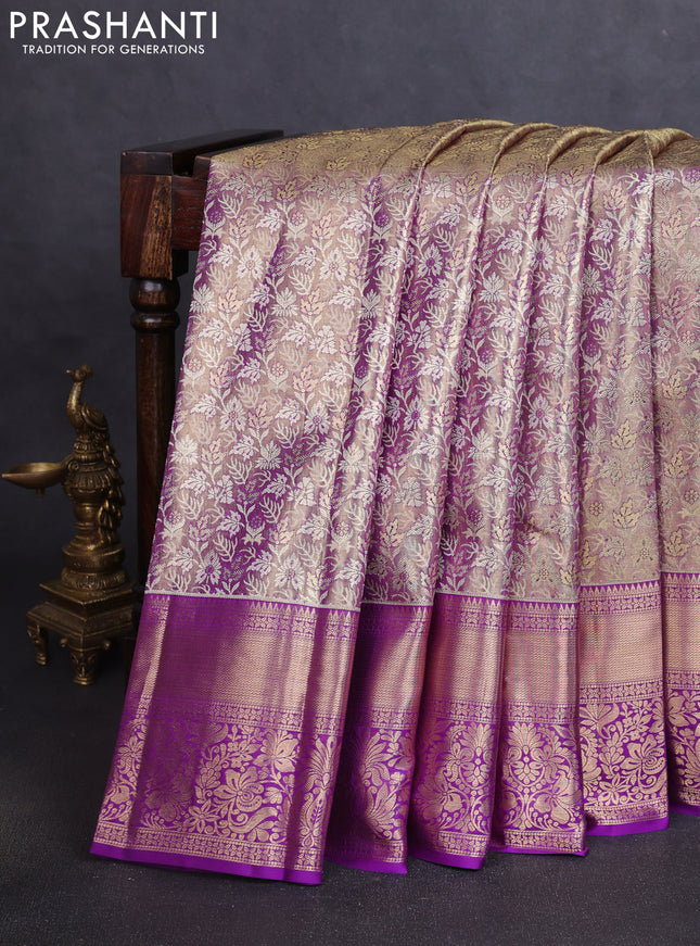 Pure kanchipuram tissue silk saree dual shade of purple and purple with allover zari woven brocade weaves and long zari woven border