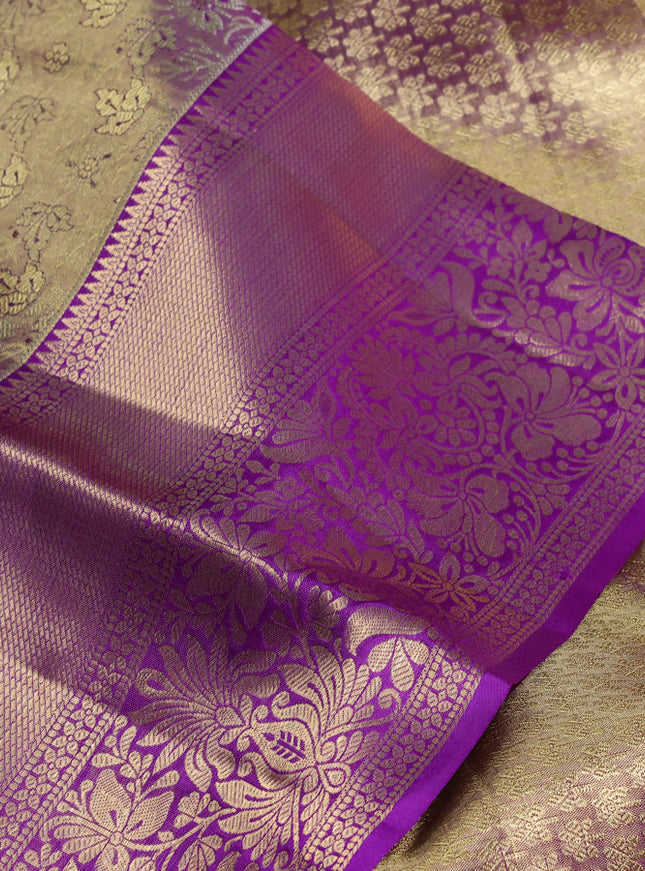 Pure kanchipuram tissue silk saree dual shade of purple and purple with allover zari woven brocade weaves and long zari woven border