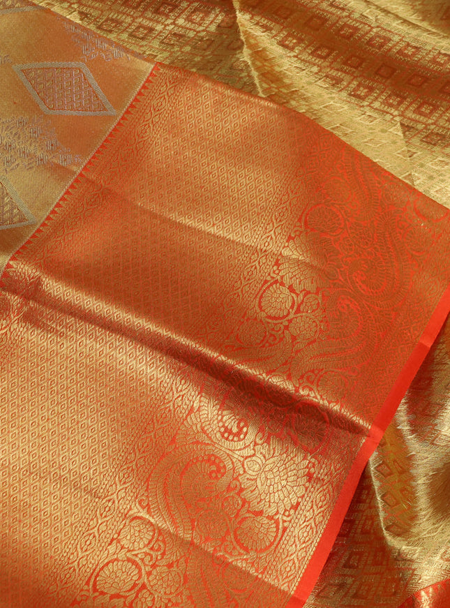 Pure kanchipuram tissue silk saree dual shade of orange and orange with allover zari woven brocade weaves and long zari woven border