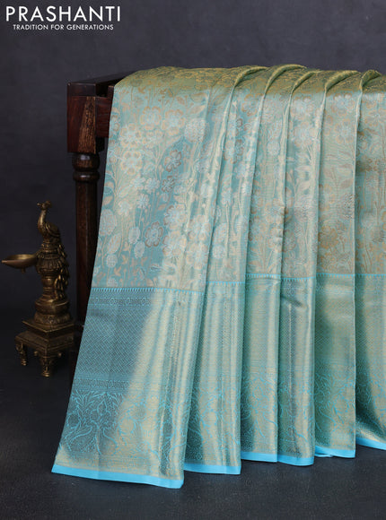 Pure kanchipuram tissue silk saree light blue with allover floral zari woven brocade weaves and zai woven border