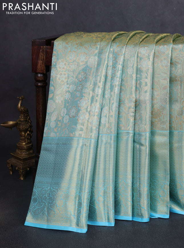 Pure kanchipuram tissue silk saree light blue with allover floral zari woven brocade weaves and zai woven border