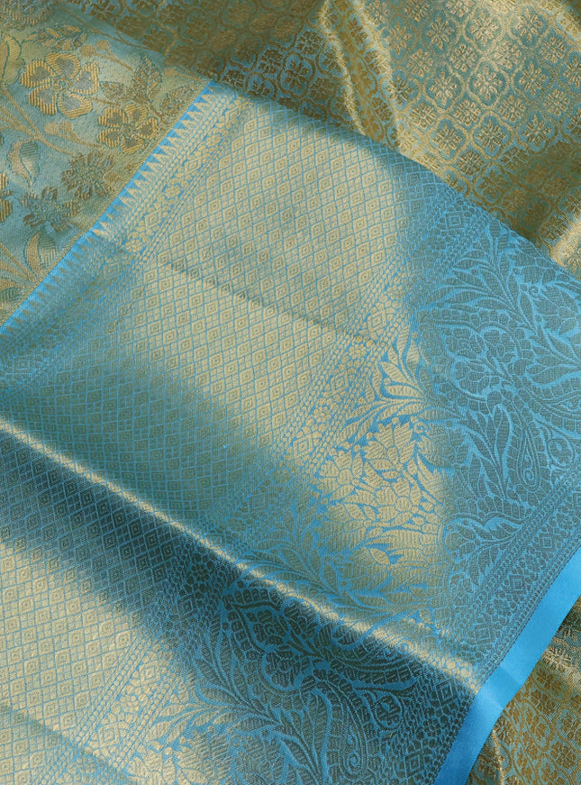 Pure kanchipuram tissue silk saree light blue with allover floral zari woven brocade weaves and zai woven border
