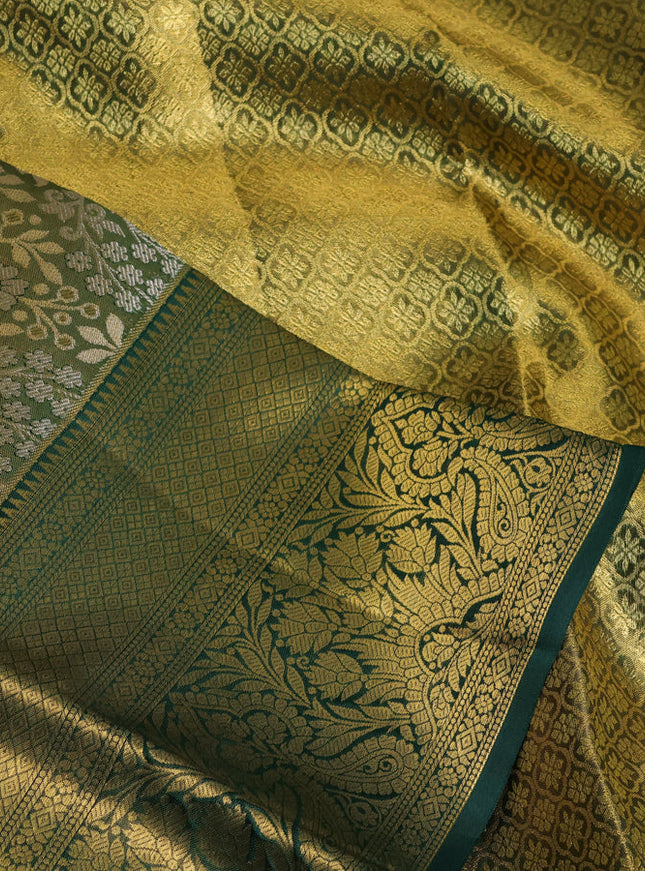 Pure kanchipuram tissue silk saree dual shade of green and green with allover floral zari woven brocade weaves and zari woven border