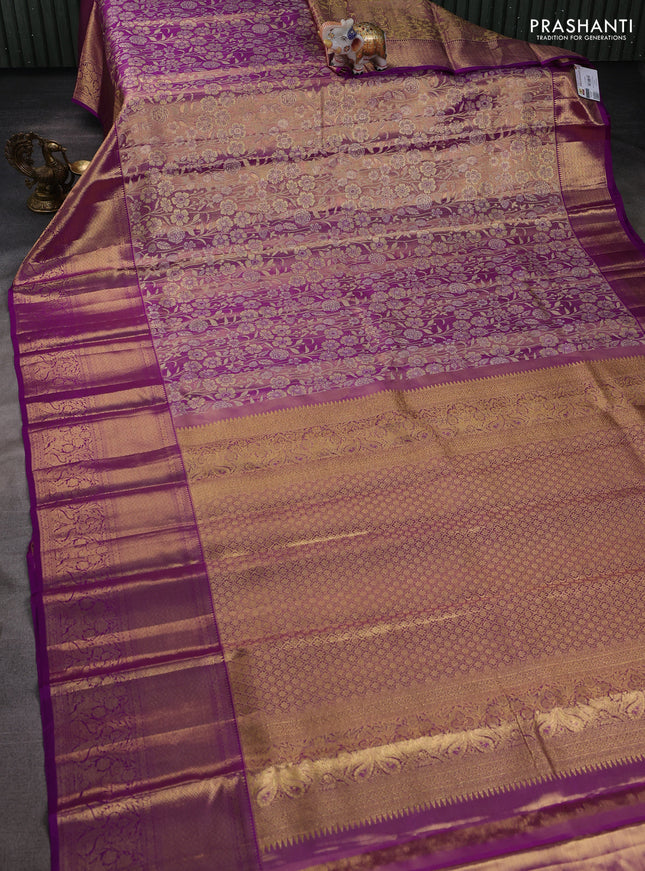 Pure kanchipuram tissue silk saree dual shade of purple and purple with allover floral zari woven brocade weaves and long zari woven border