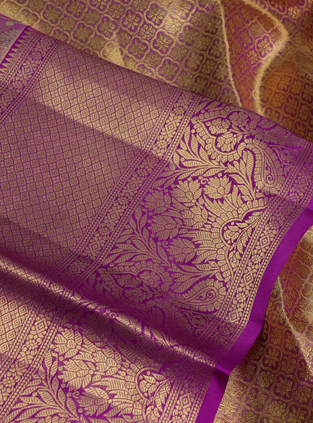 Pure kanchipuram tissue silk saree dual shade of purple and purple with allover floral zari woven brocade weaves and long zari woven border