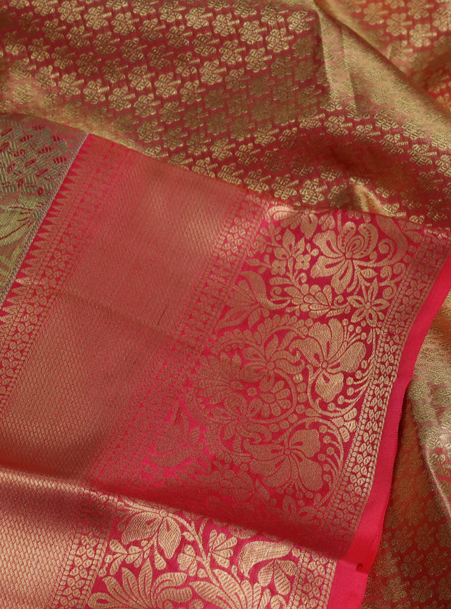 Pure kanchipuram tissue silk saree peach pink with allover floral zari woven brocade weaves and zari woven border