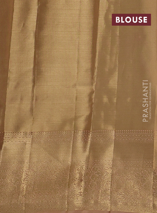 Pure kanchipuram tissue silk saree sandal and pastel peach with allover floral zari woven brocade weaves and zari woven border