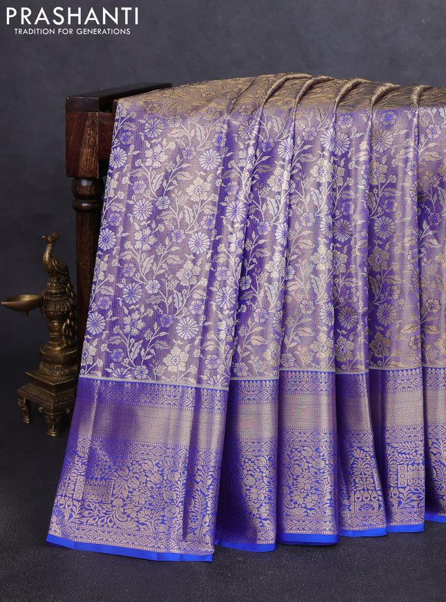Pure kanchipuram tissue silk saree dual shade of blue and royal blue with allover floral zari woven brocade weaves and zari woven border
