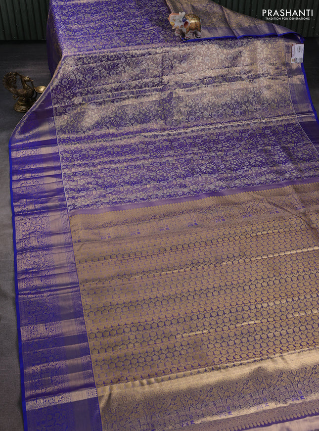 Pure kanchipuram tissue silk saree dual shade of blue and royal blue with allover floral zari woven brocade weaves and zari woven border
