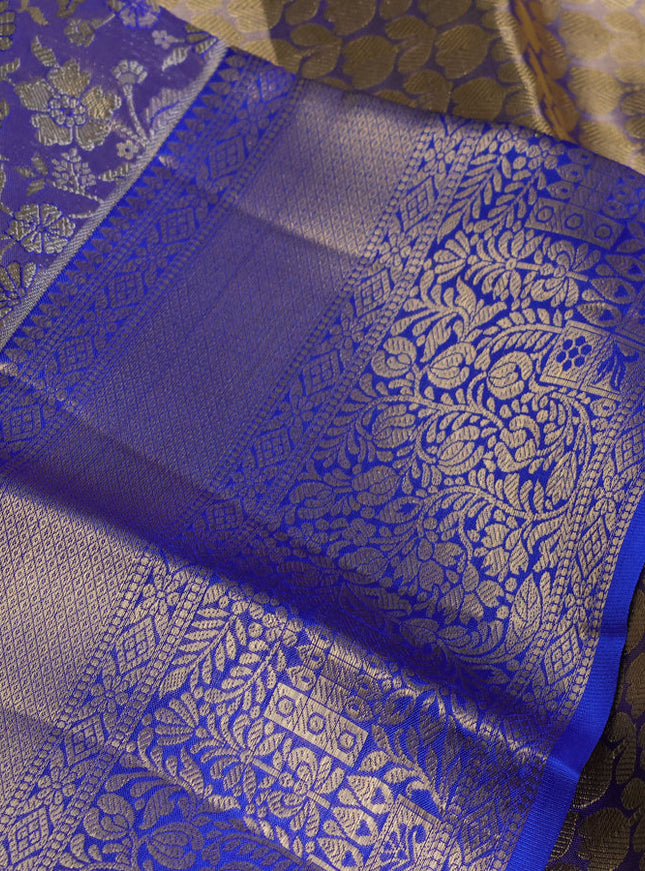 Pure kanchipuram tissue silk saree dual shade of blue and royal blue with allover floral zari woven brocade weaves and zari woven border