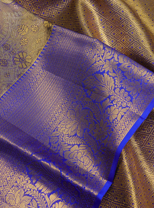 Pure kanchipuram tissue silk saree dual shade of blue and royal blue with allover zari woven brocade weaves and rich zari woven border