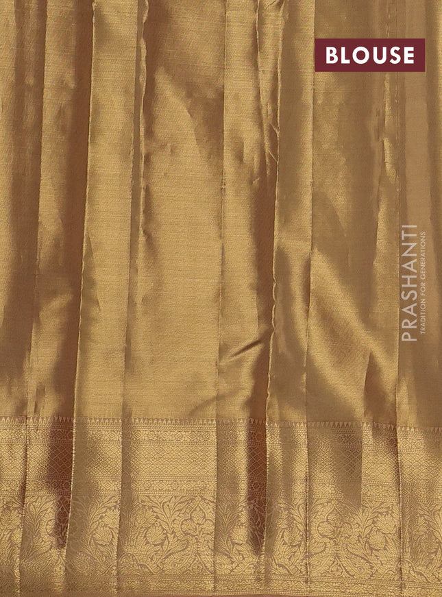 Pure kanchipuram tissue silk saree mild peach shade with allover floral zari woven brocade weaves and zari woven border