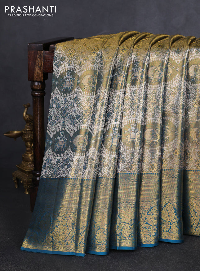 Pure kanchipuram tissue silk saree dual shade of gold and peacock green with allover zari woven brocade weaves and long rich zari woven border
