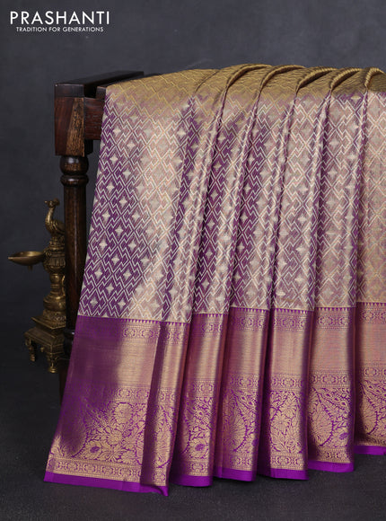 Pure kanchipuram tissue silk saree dual shade of gold and purple with allover zari woven geometric brocade weaves and long rich zari woven border