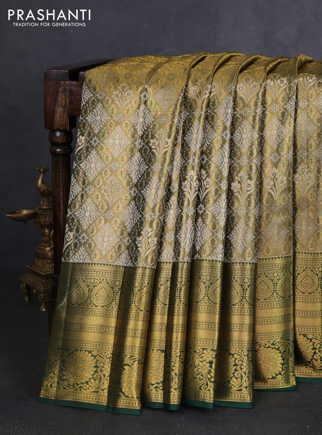 Pure kanchipuram tissue silk saree gold and bottle green with allover zari woven brocade weaves and long rich zari woven floral border