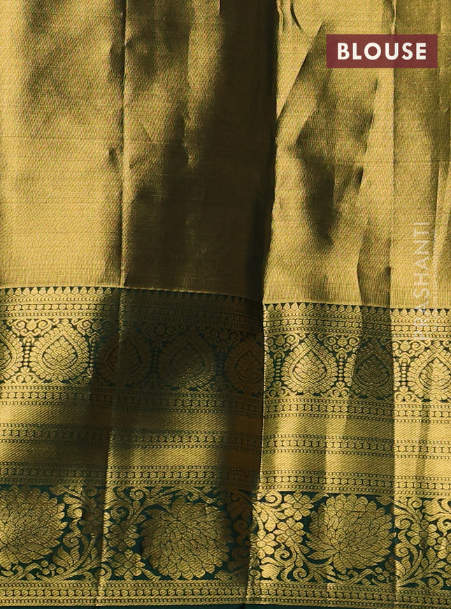 Pure kanchipuram tissue silk saree gold and bottle green with allover zari woven brocade weaves and long rich zari woven floral border