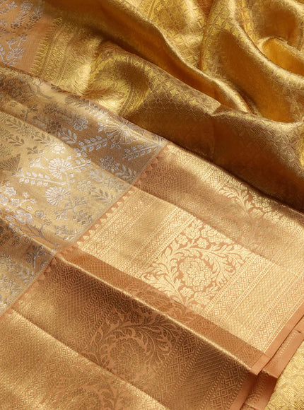 Pure kanchipuram tissue silk saree sandal with allover silver zari woven brocade weaves and long rich zari woven border