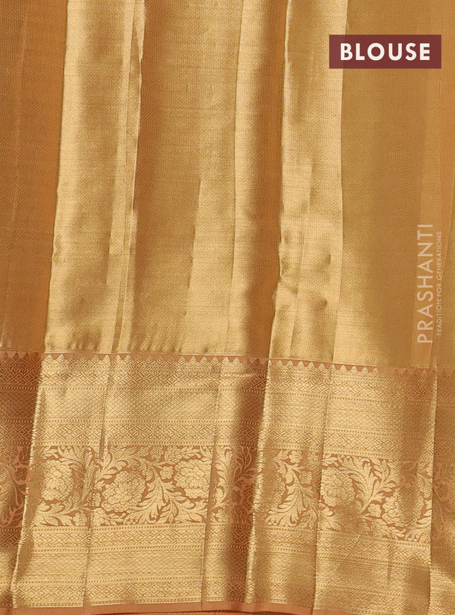 Pure kanchipuram tissue silk saree sandal with allover silver zari woven brocade weaves and long rich zari woven border