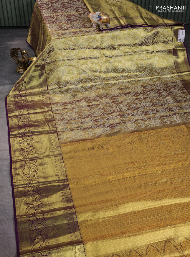 Pure kanchipuram tissue silk saree gold and purple with allover zari woven brocade weaves and long rich zari woven border