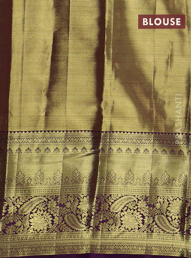 Pure kanchipuram tissue silk saree gold and purple with allover zari woven brocade weaves and long rich zari woven border
