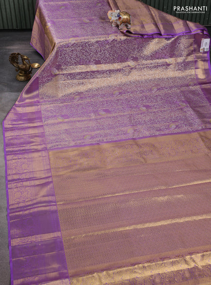 Pure kanchipuram tissue silk saree lavender with allover zari woven brocade weaves and long rich zari woven border