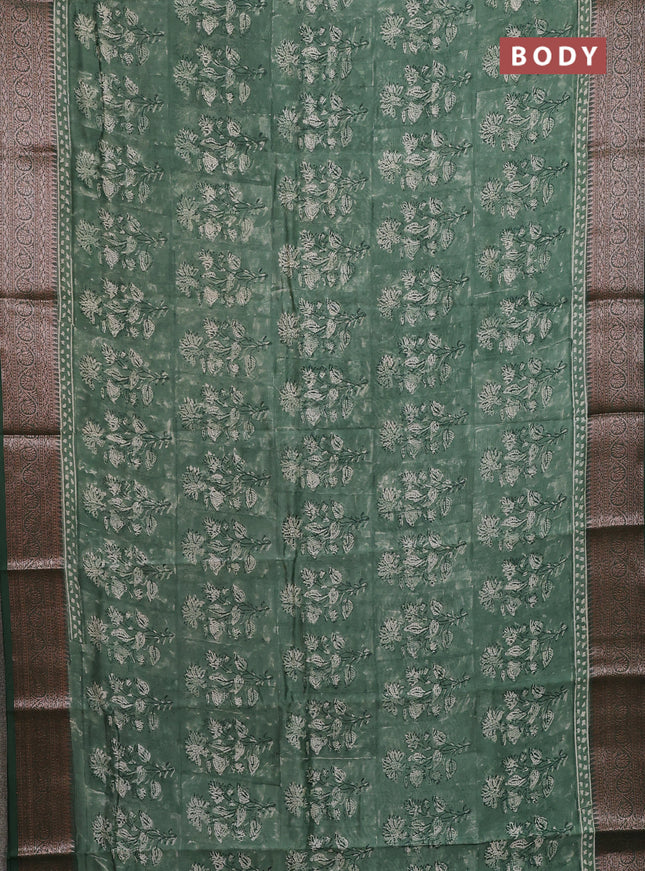 Chanderi silk cotton saree sap green with allover prints and banarasi style border