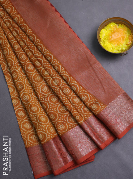 Chanderi silk cotton saree dark mustard and rust shade with allover prints and banarasi style border
