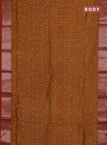 Chanderi silk cotton saree dark mustard and rust shade with allover prints and banarasi style border