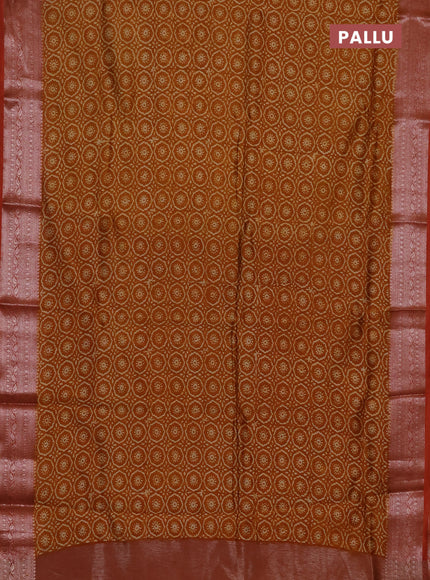 Chanderi silk cotton saree dark mustard and rust shade with allover prints and banarasi style border