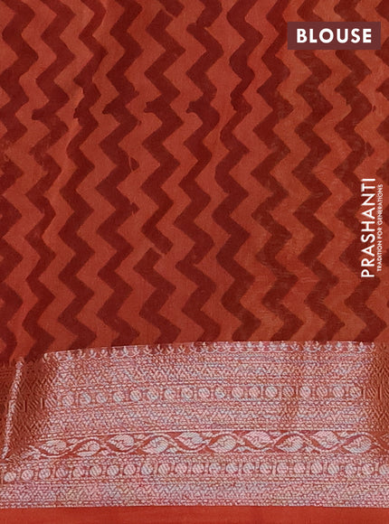 Chanderi silk cotton saree dark mustard and rust shade with allover prints and banarasi style border