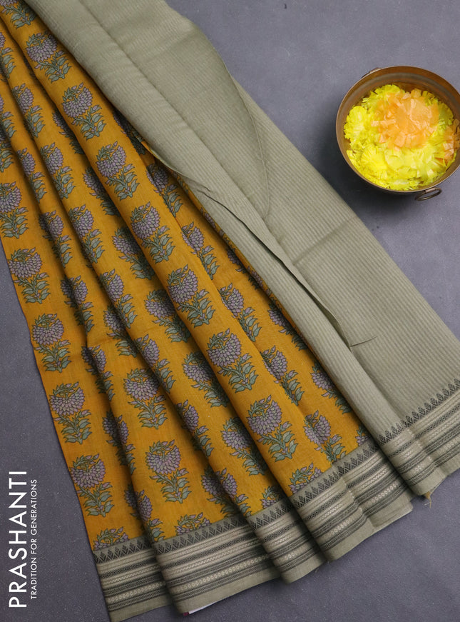Chanderi silk cotton saree mustard yellow and elaichi green with allover prints and thread woven border