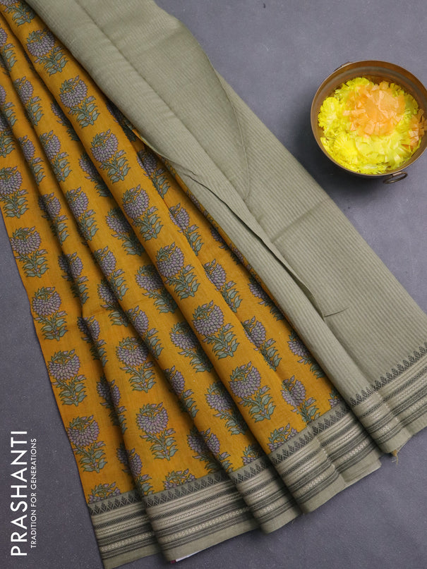 Chanderi silk cotton saree mustard yellow and elaichi green with allover prints and thread woven border