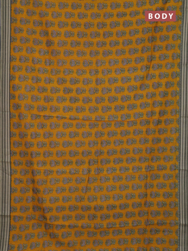 Chanderi silk cotton saree mustard yellow and elaichi green with allover prints and thread woven border