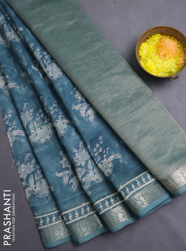 Chanderi silk cotton saree pastel green shade with allover prints and zari woven border