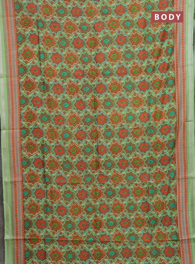 Chanderi silk cotton saree light green and orange with allover prints and zari woven border