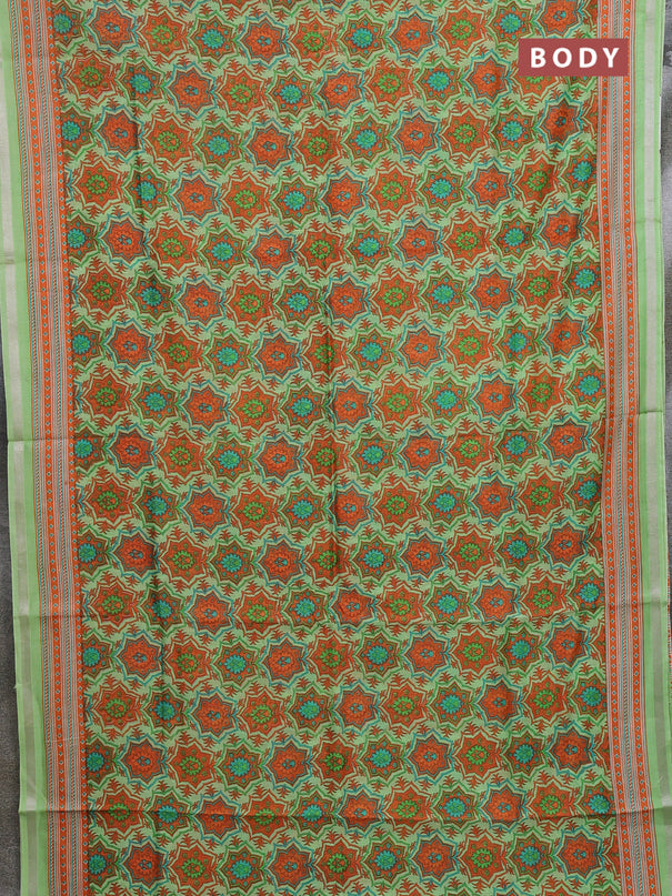 Chanderi silk cotton saree light green and orange with allover prints and zari woven border