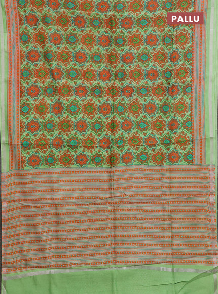 Chanderi silk cotton saree light green and orange with allover prints and zari woven border