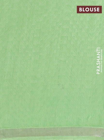 Chanderi silk cotton saree light green and orange with allover prints and zari woven border