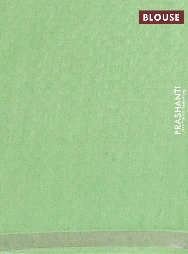 Chanderi silk cotton saree light green and orange with allover prints and zari woven border