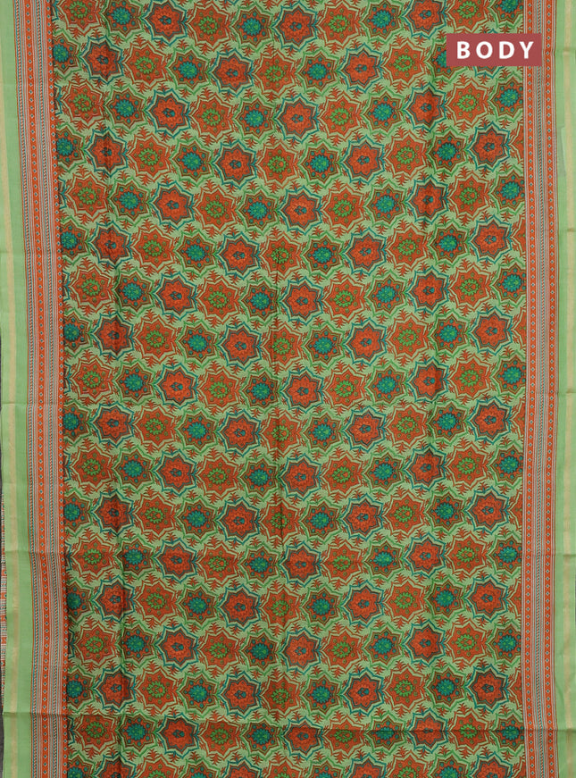 Chanderi silk cotton saree light green and orange with allover prints and zari woven border