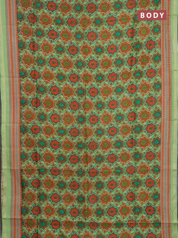 Chanderi silk cotton saree light green and orange with allover prints and zari woven border
