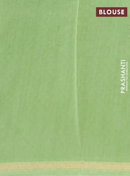 Chanderi silk cotton saree light green and orange with allover prints and zari woven border